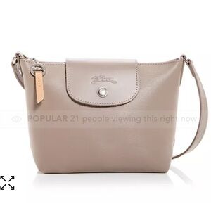 SOLD Longchamp le Pliage city leather crossbody in taupe. NEW